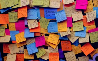 board filled with post it notes