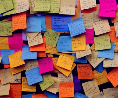 board filled with post it notes