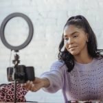 woman looking at a camera