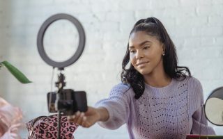 woman looking at a camera