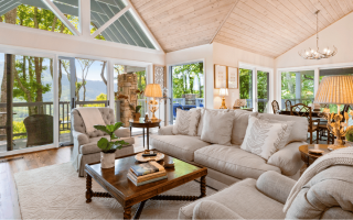 living room with tan couches and wood coffee table