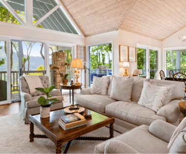 living room with tan couches and wood coffee table