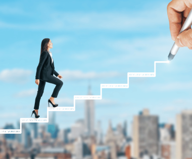 career goals a woman on stairs walking up