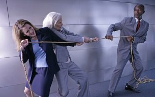 people tugging on a rope for conflict resolution