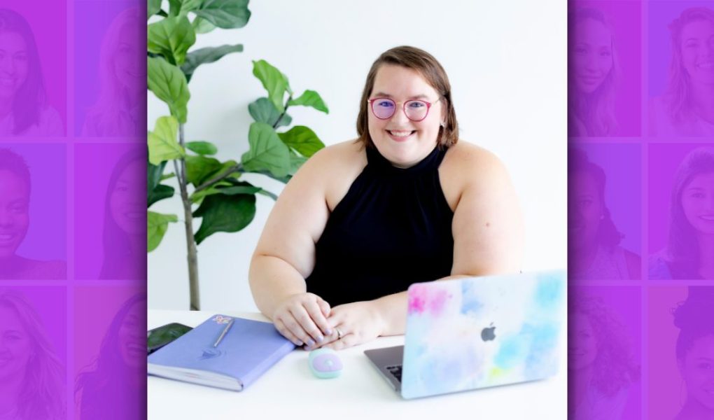 a woman sitting at a desk-Sammy Bohannon