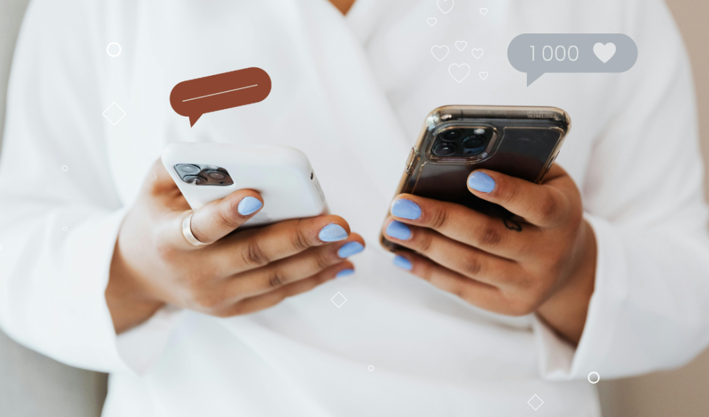 person holding two phones to navigate praise and criticism