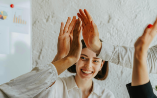 woman celebrating accomplishments