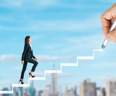 woman walking up stairs - career motivation tips