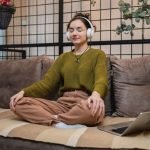 Woman sitting for self- care - self-care tools every introvert founder needs