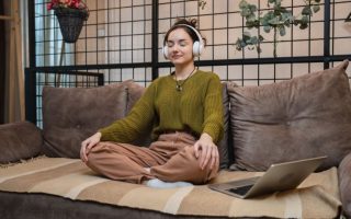 Woman sitting for self- care - self-care tools every introvert founder needs