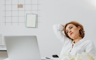 A woman stressed from over thinking - The Cost of Overthinking