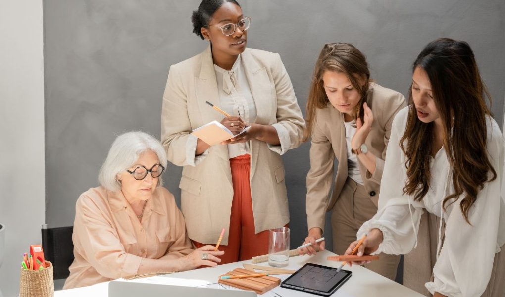Women discussing - quiet leadership at work