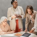 Women discussing - quiet leadership at work