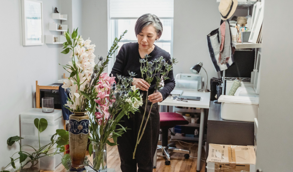 a woman utilizing florals for an easy home refresh