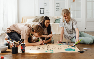 A group of women doing easy craft projects for adults.